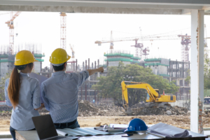 engineer group worker meeting discussion with construction blueprint site work point finger work site Construction